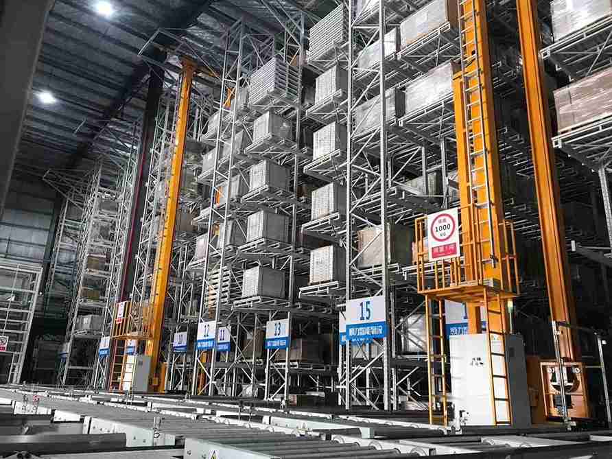 AGV and ASRS integration with high-density racking systems engineered by a professional racking supplier