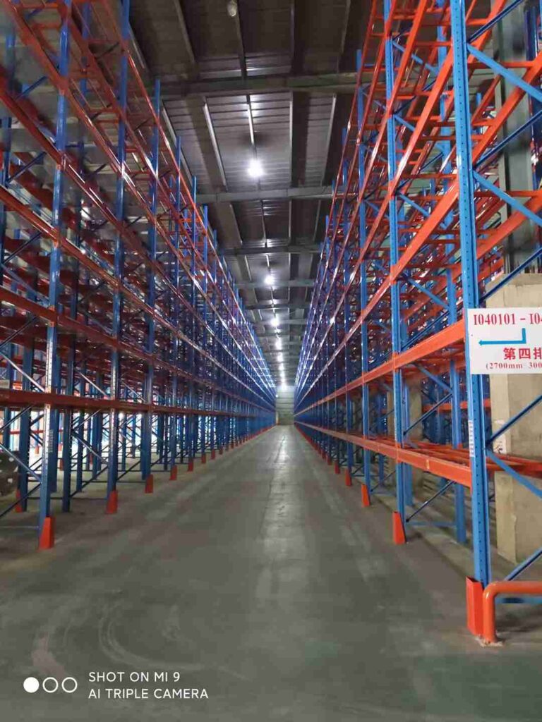 Automated turret truck operating in a high-bay strongNarrow Aisle Storagestrong racking system
