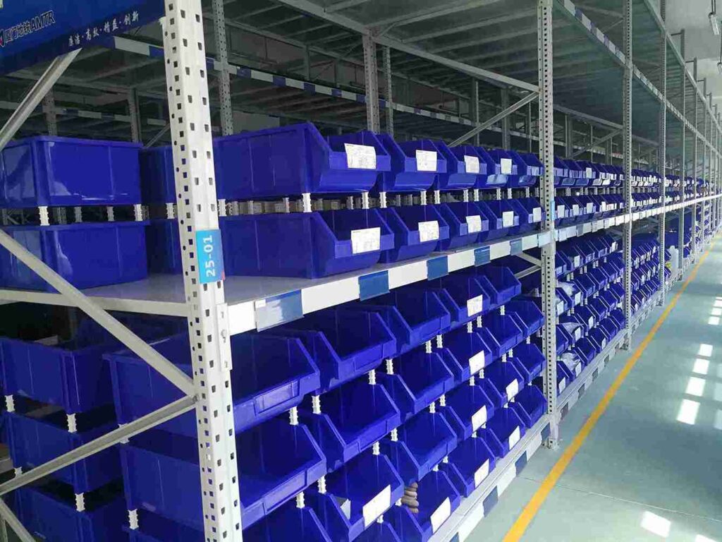  Close-up of installing critical beam racking safety accessories - beam end connector safety locks.