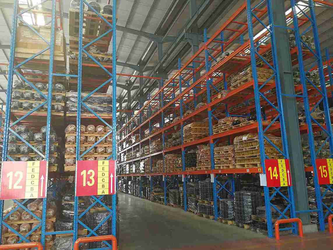 Damaged upright requiring immediate attention on a beam racking inspection checklist.