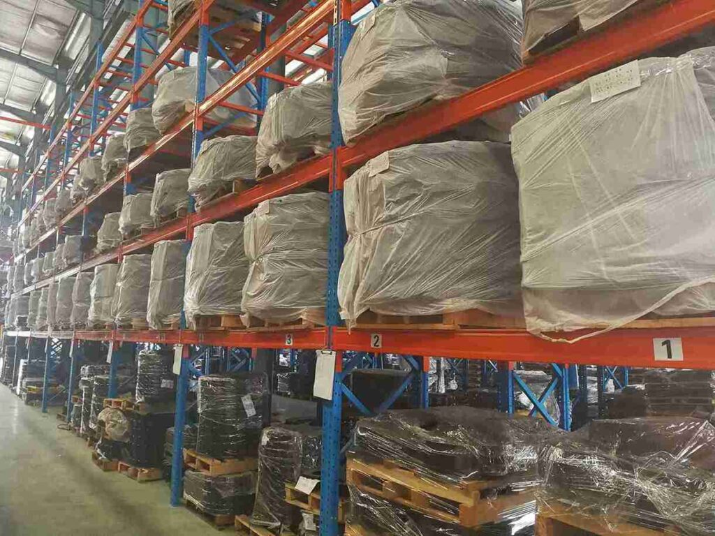 Forklift operating within a high-density drive-in Heavy-Duty Beam Racking system