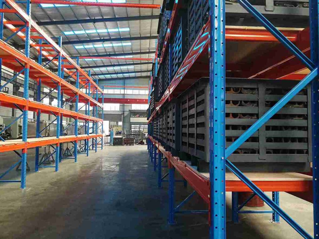 Measuring upright damage with a gauge as part of a professional beam racking compliance checklist.