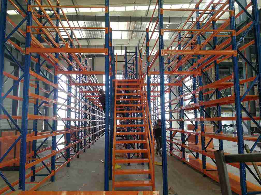 Professional audit measuring damage to control industrial racking maintenance cost