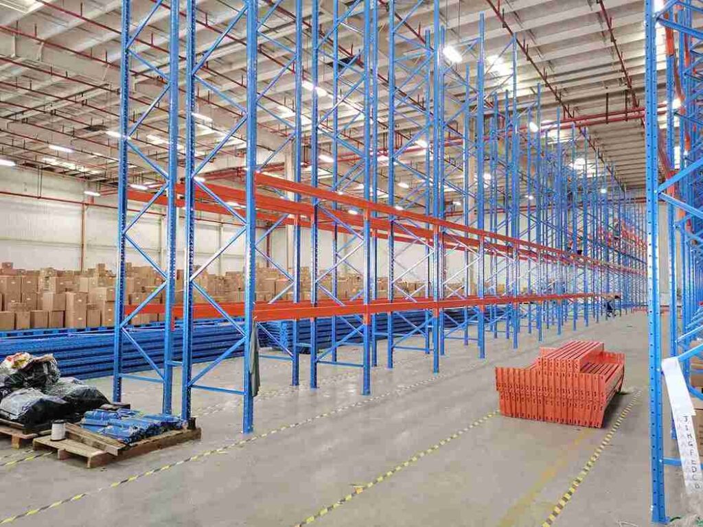 Professional engineer conducting site survey for heavy-duty racking installation