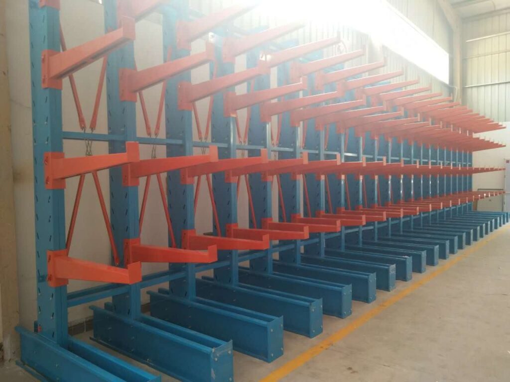 ​Cantilever beam racking​​ system storing steel pipes in manufacturing facility