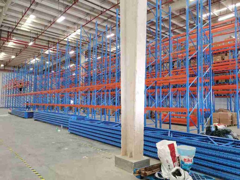 ​​Worker using ​​single C beam racking​​ for efficient storage​