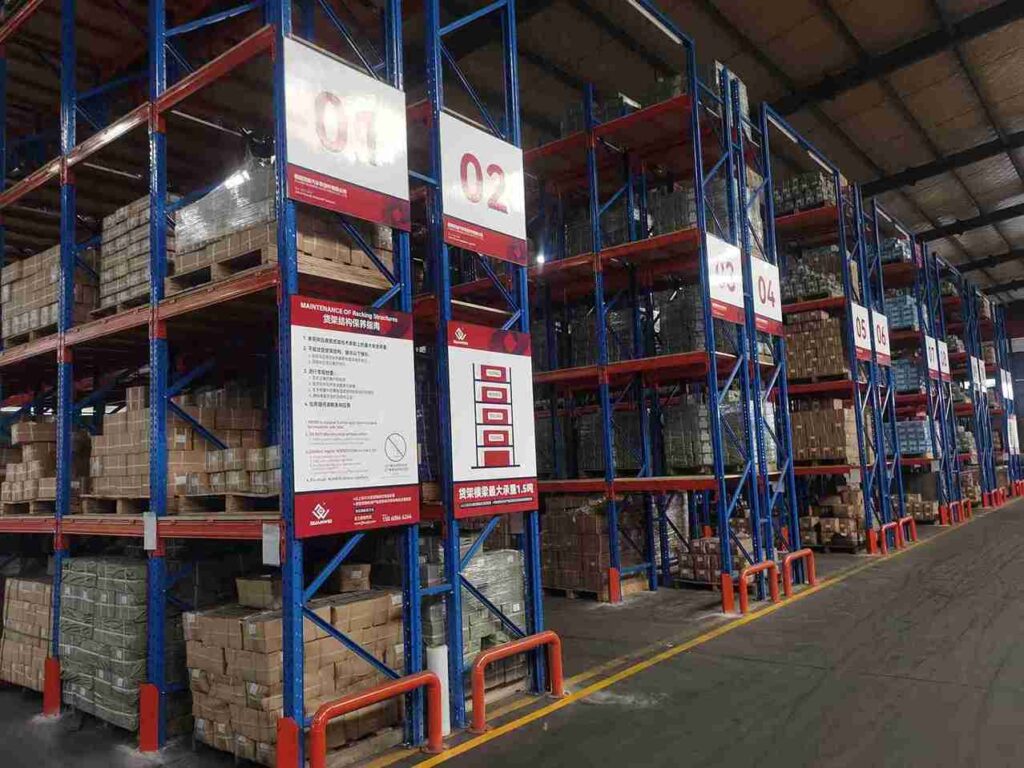 Comparison of pallet rack load signage materials aluminum, stainless steel, PVC for different environments.