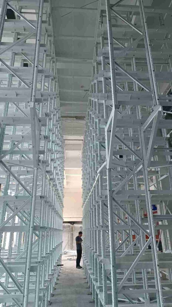 Cordless impact wrench among essential beam racking tools required for precision fastening in solo warehouse installation