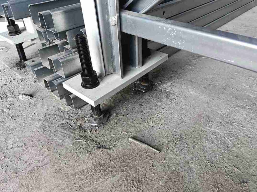 Floor compensation shim kit and laser scanner as essential beam racking tools required for uneven warehouse floors in emerging markets