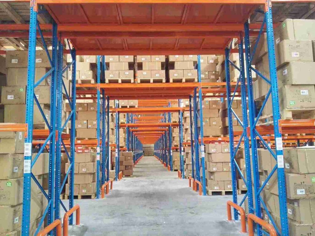 Forklift with column guard in narrow aisle, highlighting operational training for pallet racking OSHA requirements safety.