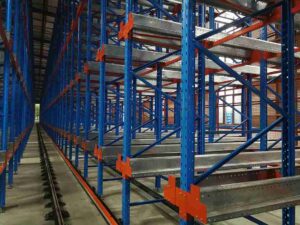 Industrial warehouse showing pallet racking system requiring regular racking inspection checklist implementation.