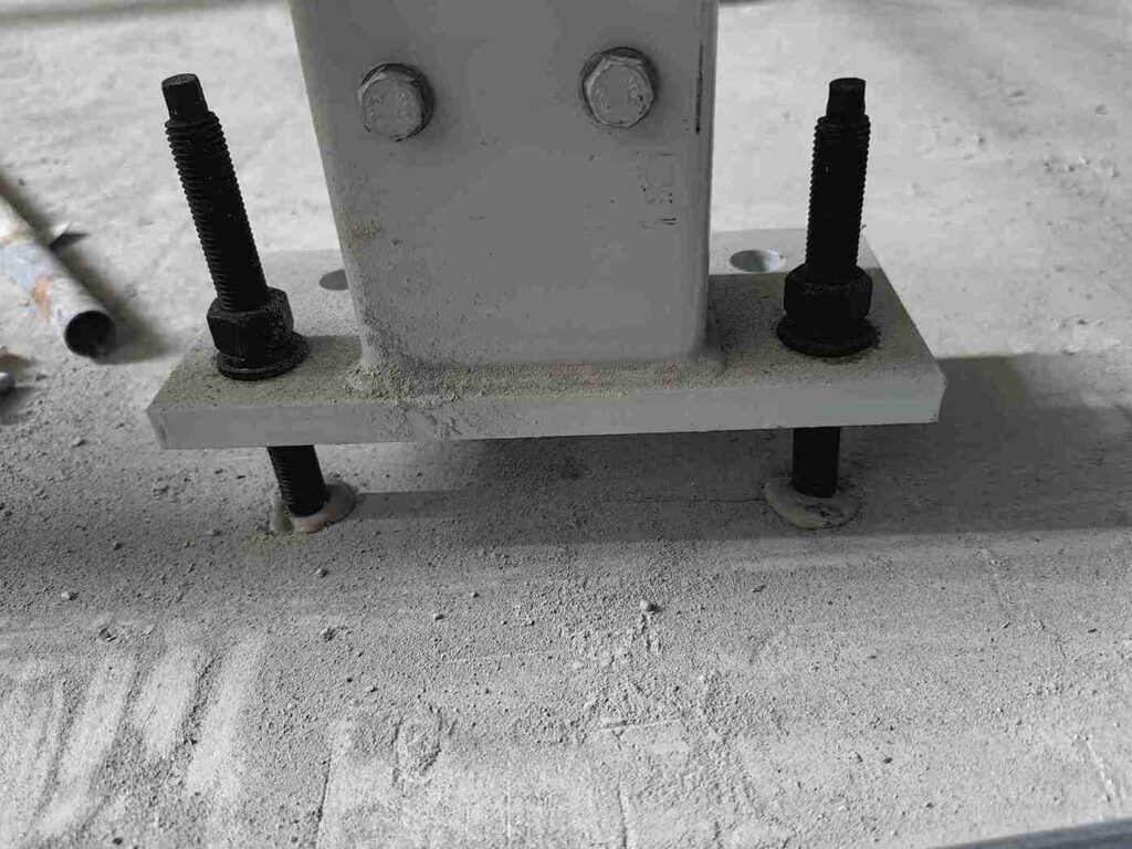 Precision diamond-core drilling using a template for installing pallet racking anchors.