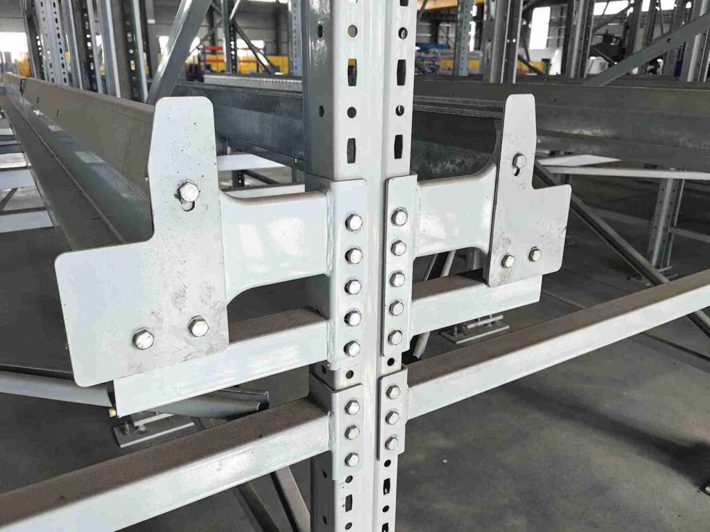 Precision-engineered components of industrial high bay pallet racking systems for structural integrity.