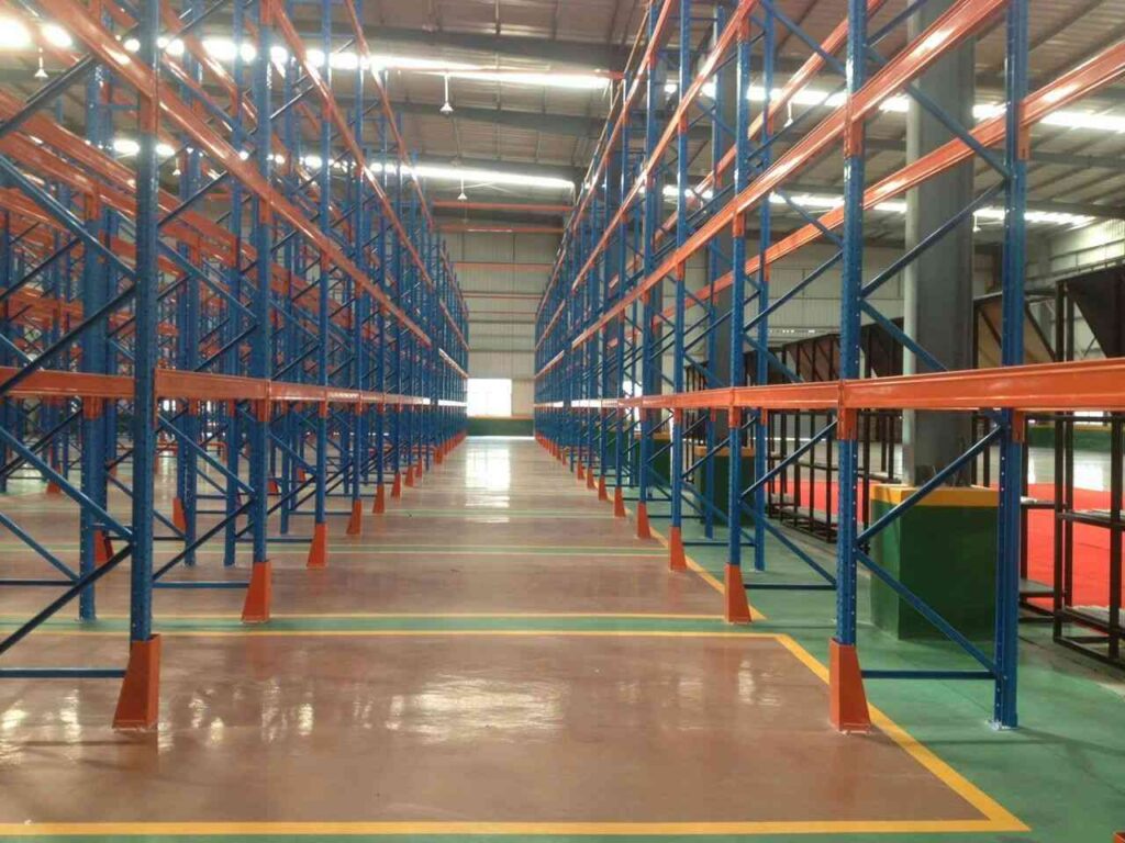 Professional installation of high-visibility pallet rack column protectors