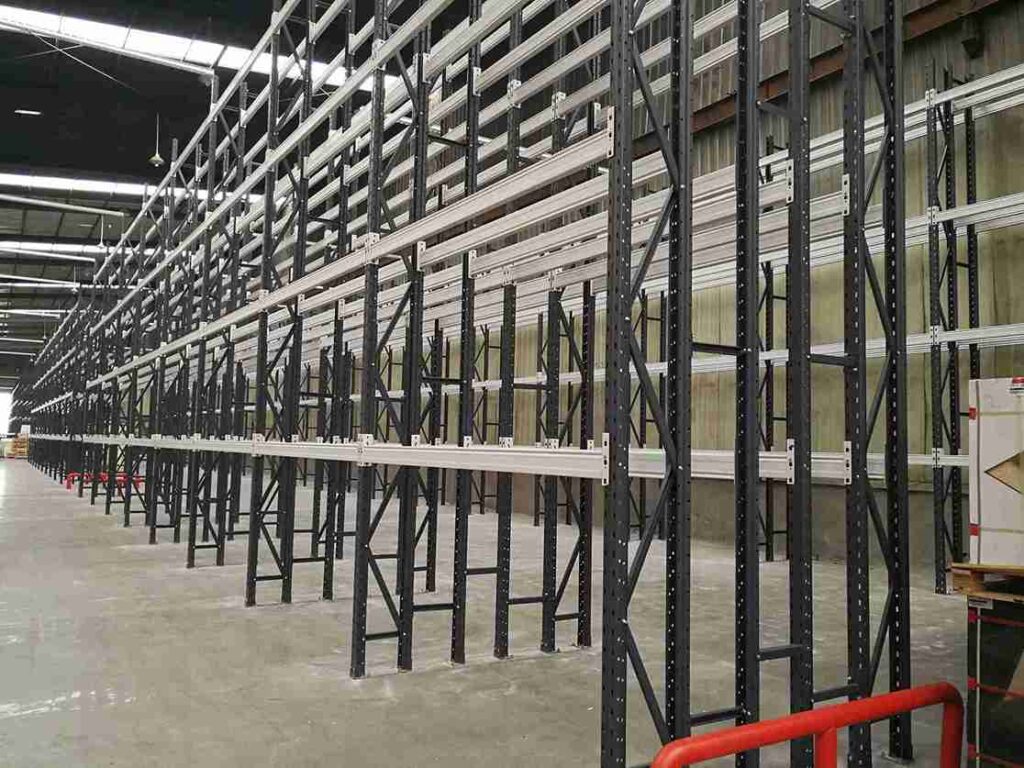 Quality assurance process for reliable used pallet racking prices - inspection, cleaning, and recoating.