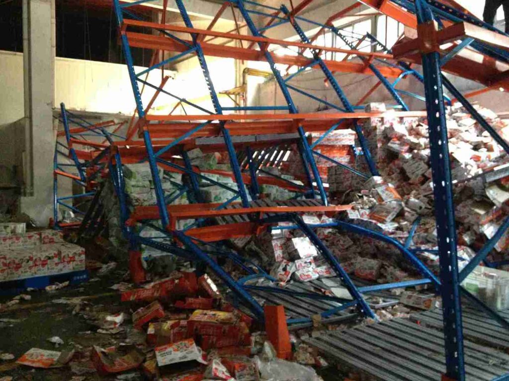 Visual evidence of the catastrophic cost of ignoring verified pallet racking load capacity and safe load limits.