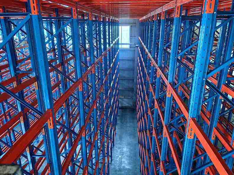 narrow aisle racking vs standard warehouse layout density comparison 3D visualization