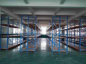 ​​Pallet racking installers in [City]​​ assembling warehouse storage system