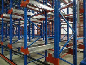 ​​Semi-automated racking solutions​​ pallet shuttle system for high-density storage​