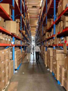 ​​narrow aisle picking efficiency​​ warehouse layout with optimized storage zones