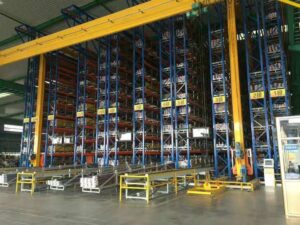 Autonomous mobile robot (AMR) for material transport in a flexible warehouse automated storage system