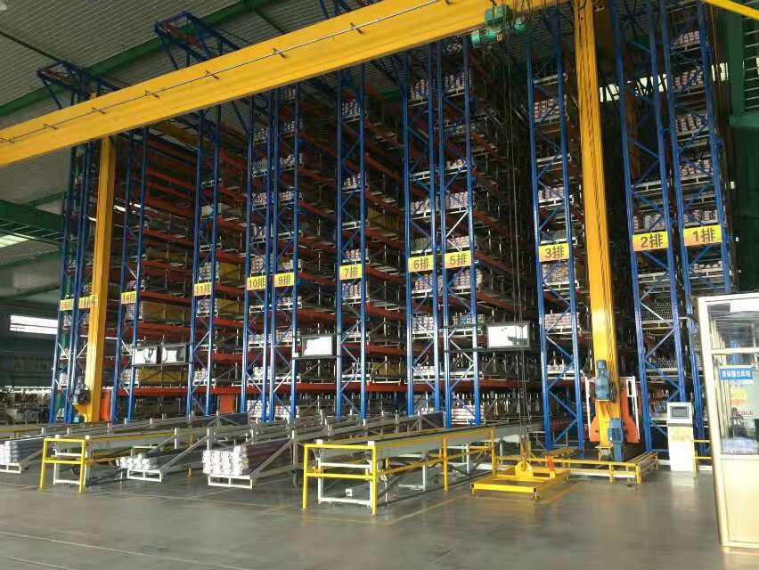 Autonomous mobile robot (AMR) for material transport in a flexible warehouse automated storage system