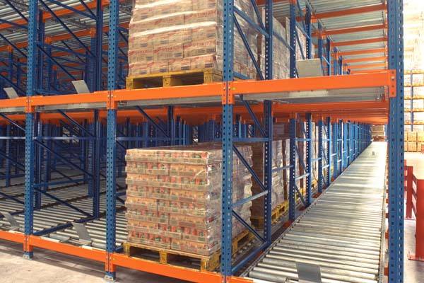 Flow racking system warehouse reduces travel time for faster order picking