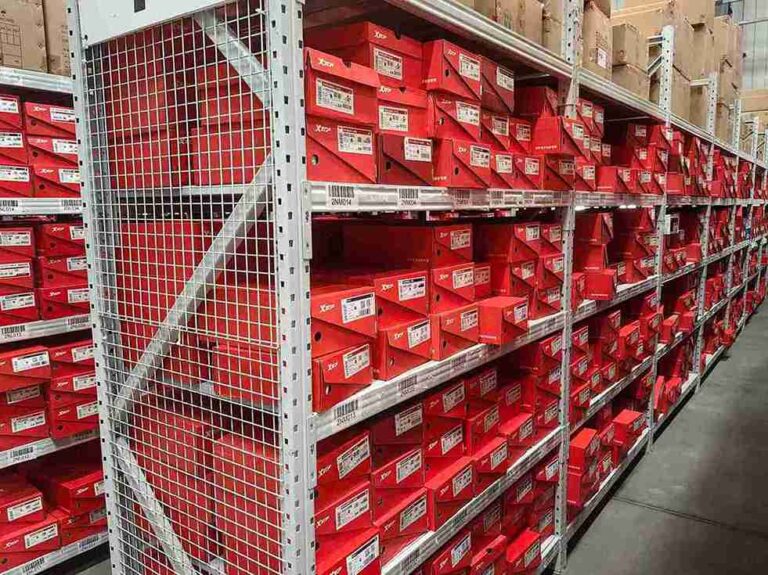 High-density warehouse storage utilizing tall boltless shelving systems to maximize space