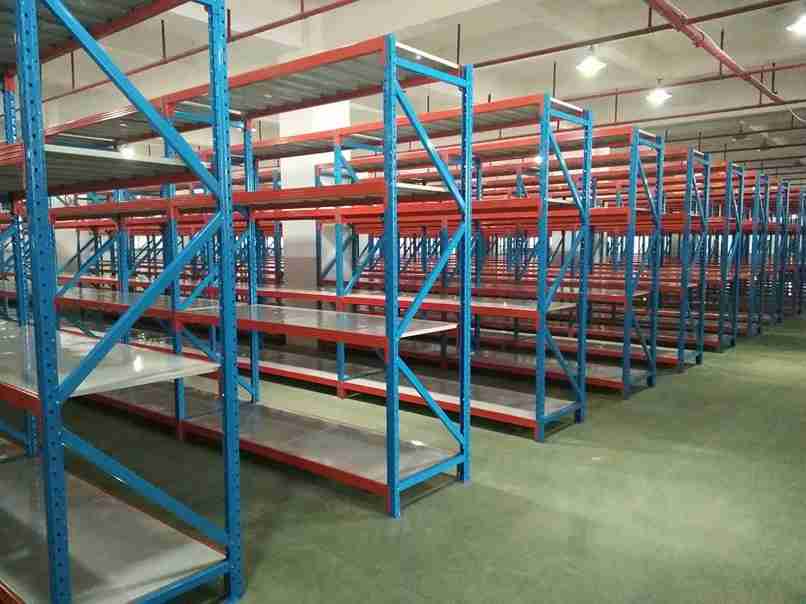 Close-up of the installation mechanism on industrial shelf dividers for racking systems