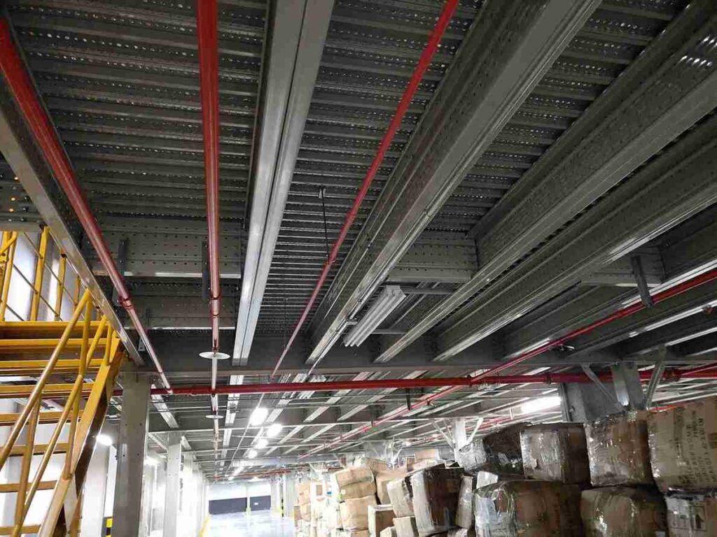 Seismic pallet gates and netting - essential for load security in mezzanine racking seismic considerations.