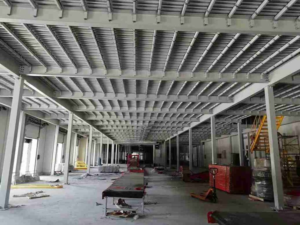 heavy-duty bolted connection detail of an industrial modular stair platform system.