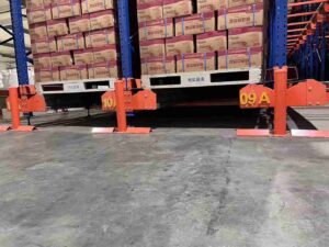 High density pallet shuttle system – forklift depositing pallet at front face of deep lane