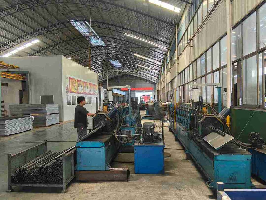 Installation of high density wire mesh decking racking with rubber mallet on step beams